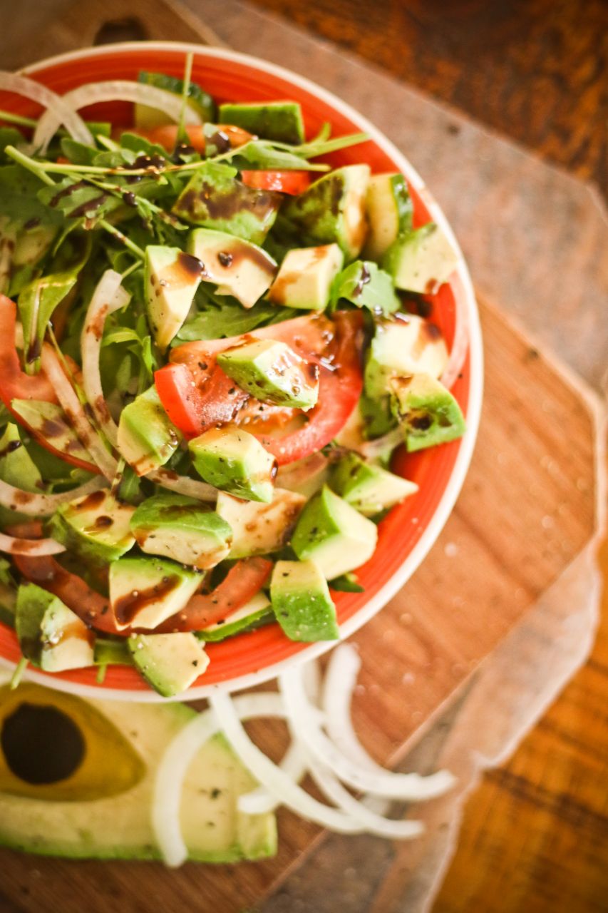 Giuseppe's Pizzeria outdoor eating area with people seated at tables.